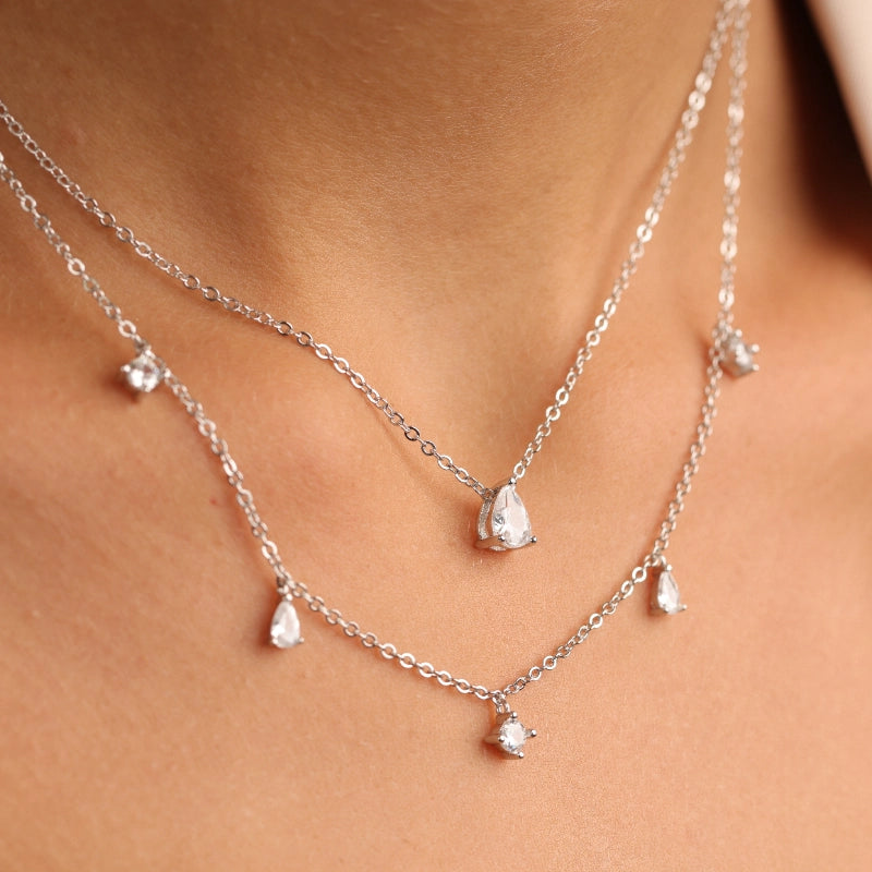 שרשרת כסף  2 שורות , שורה אחת עם תליוני טיפות קטנים שורה שניה עם תליון טיפה